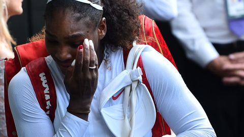 Williams leaves the court after losing to Germany's Kerber