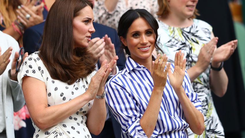 LONDON, ENGLAND - JULY 14:  Catherine, Duchess of Cambridge and Meghan, Duchess of Sussex applaud ahead of the Ladies' Singles final match between Serena Williams of The United States and Angelique Kerber of Germany on day twelve of the Wimbledon Lawn Tennis Championships at All England Lawn Tennis and Croquet Club on July 14, 2018 in London, England.  (Photo by Michael Steele/Getty Images)