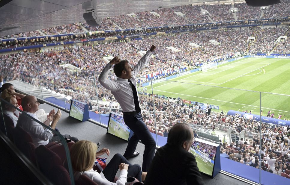 French President Emmanuel Macron shows his excitement while watching the match.