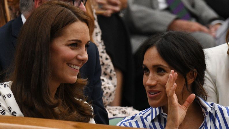 Catherine, Duchess of Cambridge, left, and Meghan, Duchess of Sussex, watch the Wimbledon Championships from the Royal Box on Saturday, July 14.