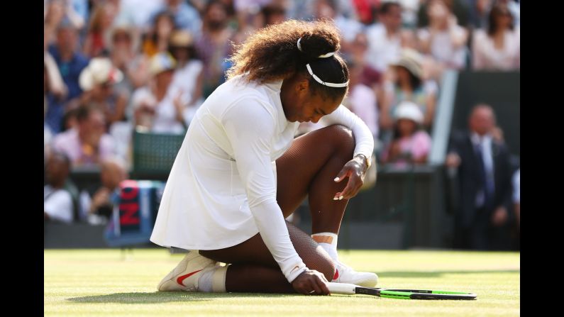 Serena Williams appears dejected during the Ladies' Singles final against Angelique Kerber on day twelve of Wimbledon Championships on Saturday, July 14, in London.