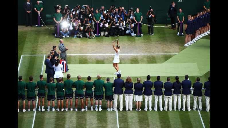 Angelique Kerber lifts the Venus Rosewater Dish after defeating Serena Williams in the Ladies' Singles final on day twelve of Wimbledon on Saturday, July 14, in London. 