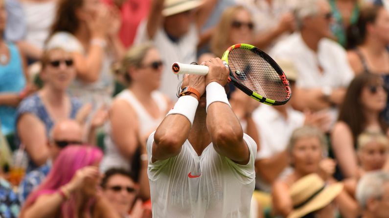 Rafael Nadal reacts after losing a point in the fifth set against Novak Djokovic during the continuation of their men's singles semifinal match at Wimbledon in London, on Saturday, July 14. 