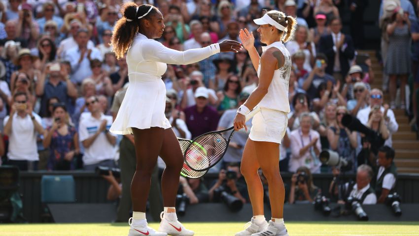 LONDON, ENGLAND - JULY 14:  Angelique Kerber of Germany (R) embraces Serena Williams of The United States after the Ladies' Singles final on day twelve of the Wimbledon Lawn Tennis Championships at All England Lawn Tennis and Croquet Club on July 14, 2018 in London, England.  (Photo by Michael Steele/Getty Images)