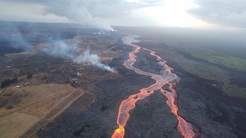 The braided lava channel extending from the fissure 8 vent (near top, center) and flowing toward the ocean.