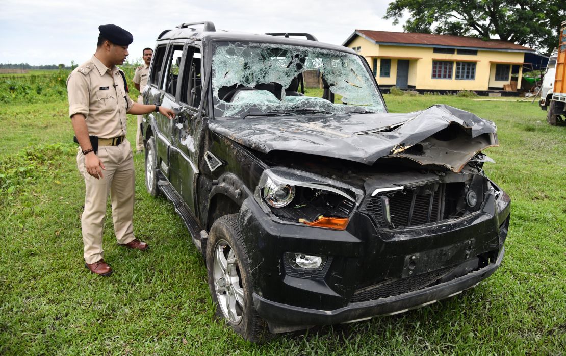This photo taken on July 10, 2018 shows a damaged vehicle in which two men were traveling in Assam when they were attacked by a mob.