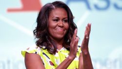 Michelle Obama waves after discussing her forthcoming memoir titled, 'Becoming', during the 2018 American Library Association Annual Conference on June 22, 2018 in New Orleans, Louisiana.  (Photo by Jonathan Bachman/Getty Images)