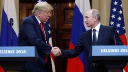 U.S. President Donald Trump, left, shakes hand with Russian President Vladimir Putin during a press conference after the meeting of U.S. President Donald Trump and Russian President Vladimir Putin at the Presidential Palace in Helsinki, Finland, Monday, July 16, 2018. (AP Photo/Alexander Zemlianichenko)