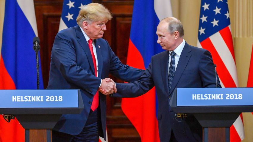 US President Donald Trump (L) and Russia's President Vladimir Putin shake hands before attending a joint press conference after a meeting at the Presidential Palace in Helsinki, on July 16, 2018. - The US and Russian leaders opened an historic summit in Helsinki, with Donald Trump promising an "extraordinary relationship" and Vladimir Putin saying it was high time to thrash out disputes around the world. (Photo by Yuri KADOBNOV / AFP)        (Photo credit should read YURI KADOBNOV/AFP/Getty Images)