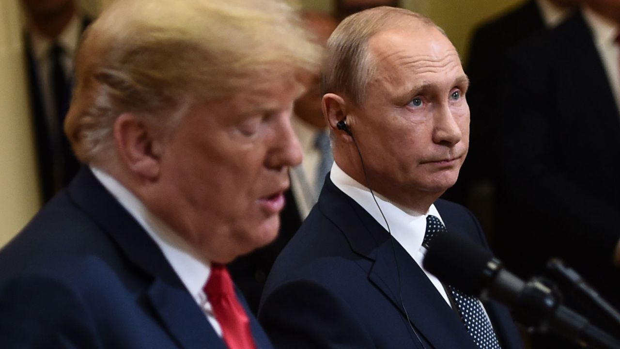 US President Donald Trump and Russia's President Vladimir Putin attend a joint press conference after a meeting at the Presidential Palace in Helsinki, on July 16, 2018. (Photo by Brendan SMIALOWSKI / AFP)        (Photo credit should read BRENDAN SMIALOWSKI/AFP/Getty Images)