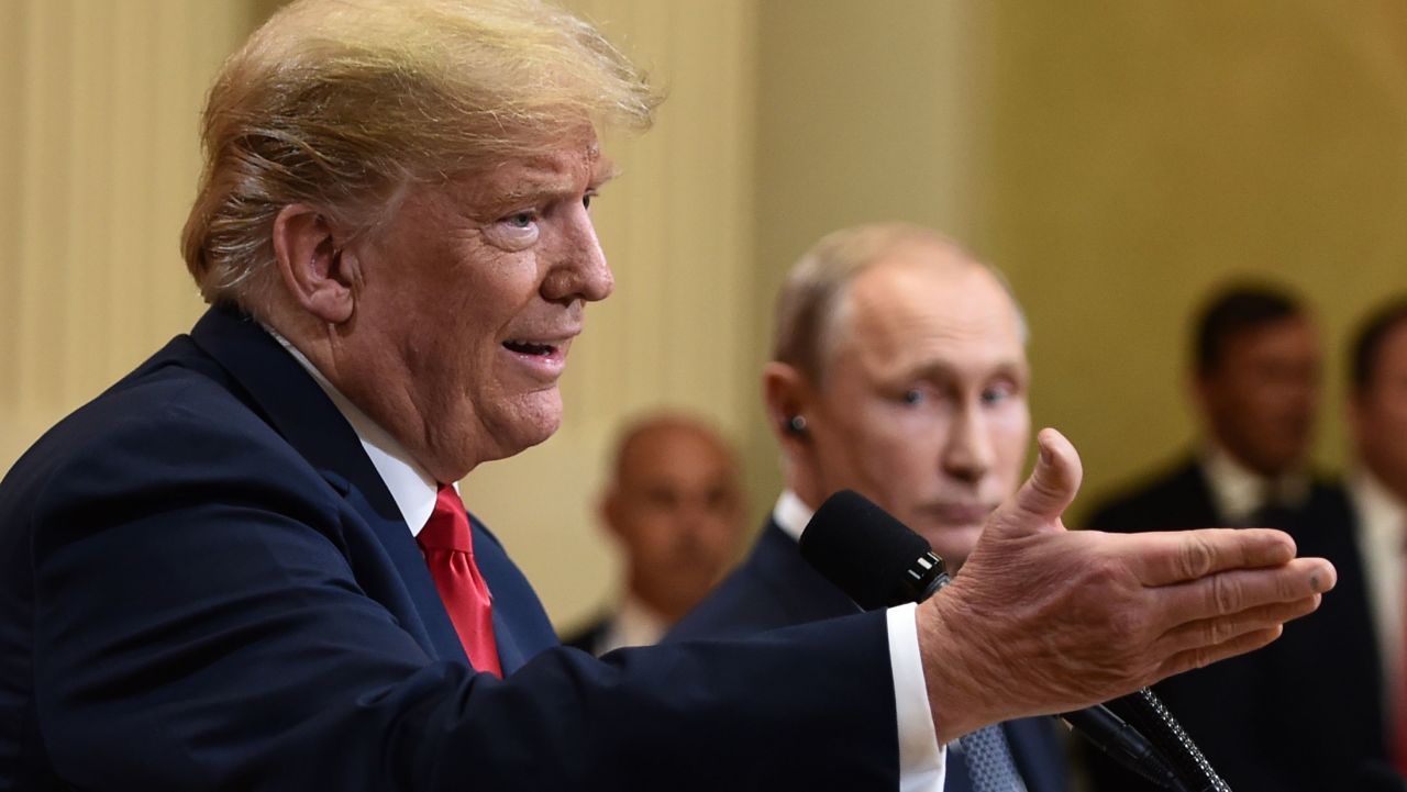 US President Donald Trump and Russia's President Vladimir Putin attend a joint press conference after a meeting at the Presidential Palace in Helsinki, on July 16, 2018. (Photo by Brendan SMIALOWSKI / AFP)        (Photo credit should read BRENDAN SMIALOWSKI/AFP/Getty Images)