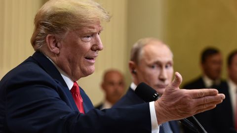 US President Donald Trump and Russia's President Vladimir Putin attend a joint press conference after a meeting at the Presidential Palace in Helsinki, on July 16, 2018. (Photo by Brendan SMIALOWSKI / AFP) (Photo credit should read BRENDAN SMIALOWSKI/AFP/Getty Images)