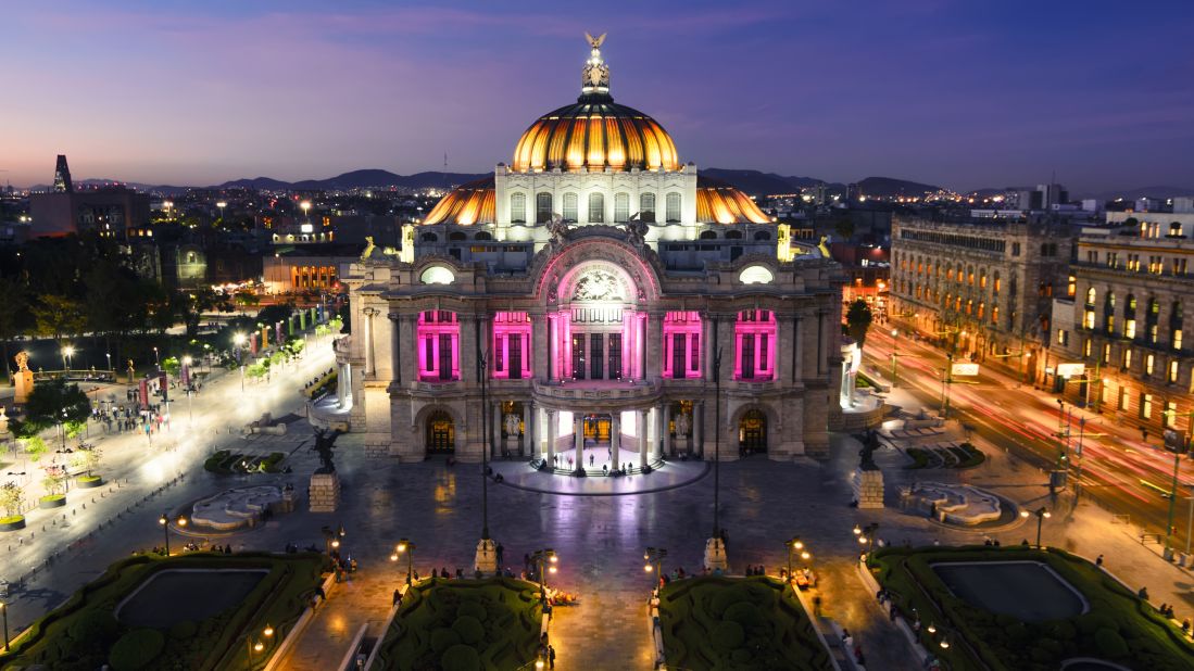 <strong>October in Mexico City: </strong>At night, the Palacio de Bellas Artes lights up the city.