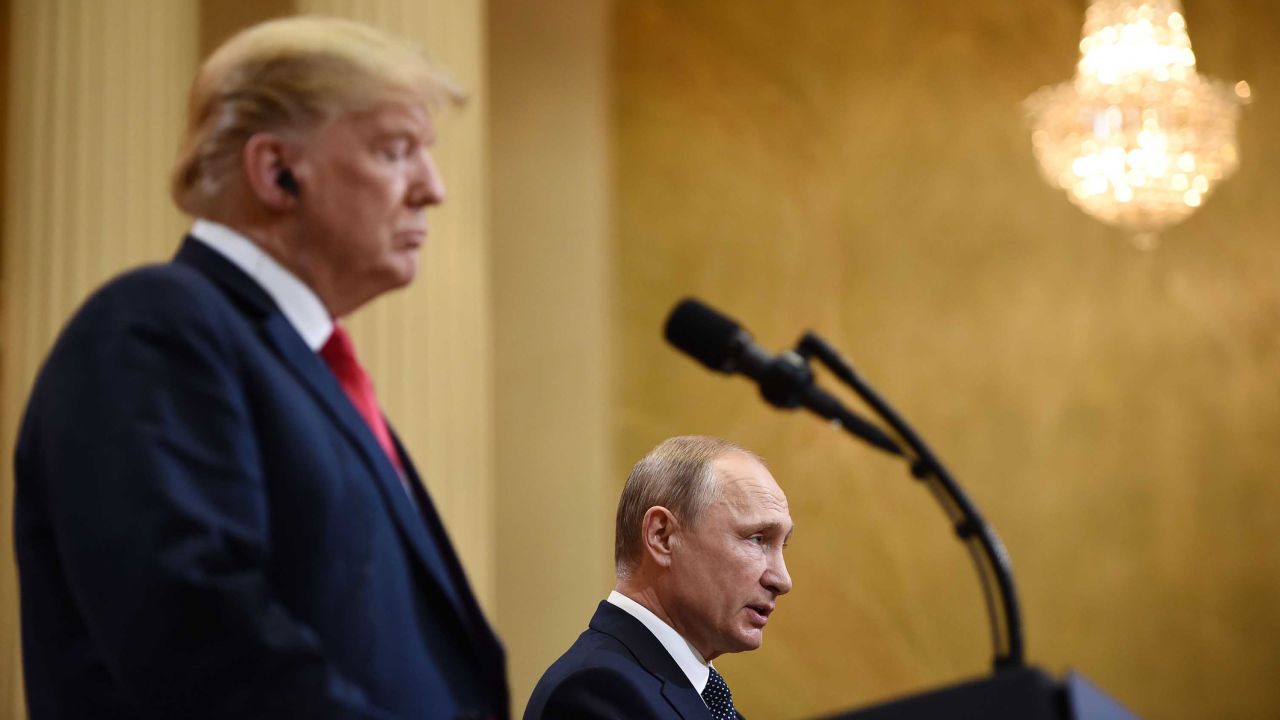 US President Donald Trump (L) and Russia's President Vladimir Putin attend a joint press conference after a meeting at the Presidential Palace in Helsinki, on July 16, 2018. - The US and Russian leaders opened an historic summit in Helsinki, with Donald Trump promising an "extraordinary relationship" and Vladimir Putin saying it was high time to thrash out disputes around the world. (Photo by Brendan SMIALOWSKI / AFP)        (Photo credit should read BRENDAN SMIALOWSKI/AFP/Getty Images)