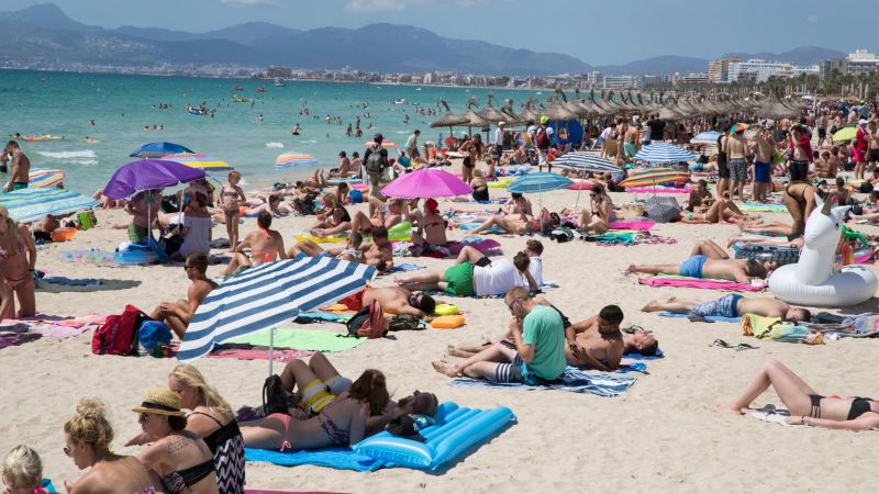 Spanish holiday resort of Palma bans walking around topless