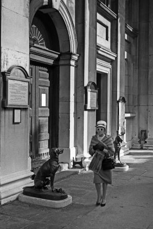 A well-dressed woman passes St John's, Smith Square, a Grade I listed church. 