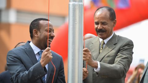 Ethiopian Prime Minister Abiy Ahmed (L) and President Isaias Afeworki of Eritrea (R) celebrate the reopening of the Embassy of Eritrea in Ethiopia as relations between both countries thaw. 