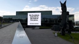 A picture taken on July 14, 2018 shows a board reading "Mr. President, welcome to the land of free press" and displayed by Finnish newspaper Helsingin Sanomat on the facade of the Music Centre in Helsinki on July 14, 2018. - Finland may have largely shut down for the summer holidays but officials and police have been drafted back into work ahead of a historic summit in Helsinki between Donald Trump and Vladimir Putin. (Photo by Aleksi Tuomola / LEHTIKUVA / AFP) / Finland OUT        (Photo credit should read ALEKSI TUOMOLA/AFP/Getty Images)