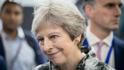 Britain's Prime Minister Theresa May speaks with guests as she opens the Farnborough Airshow, south west of London, on July 16, 2018. - Britain sought to project an image of aerospace prowess long after it leaves the European Union, at the Farnborough airshow on Monday, as Airbus and Boeing announced a raft of deals and issued optimistic outlooks for the global industry. (Photo by Matt Cardy / POOL / Getty Images)        (Photo credit should read MATT CARDY/AFP/Getty Images)