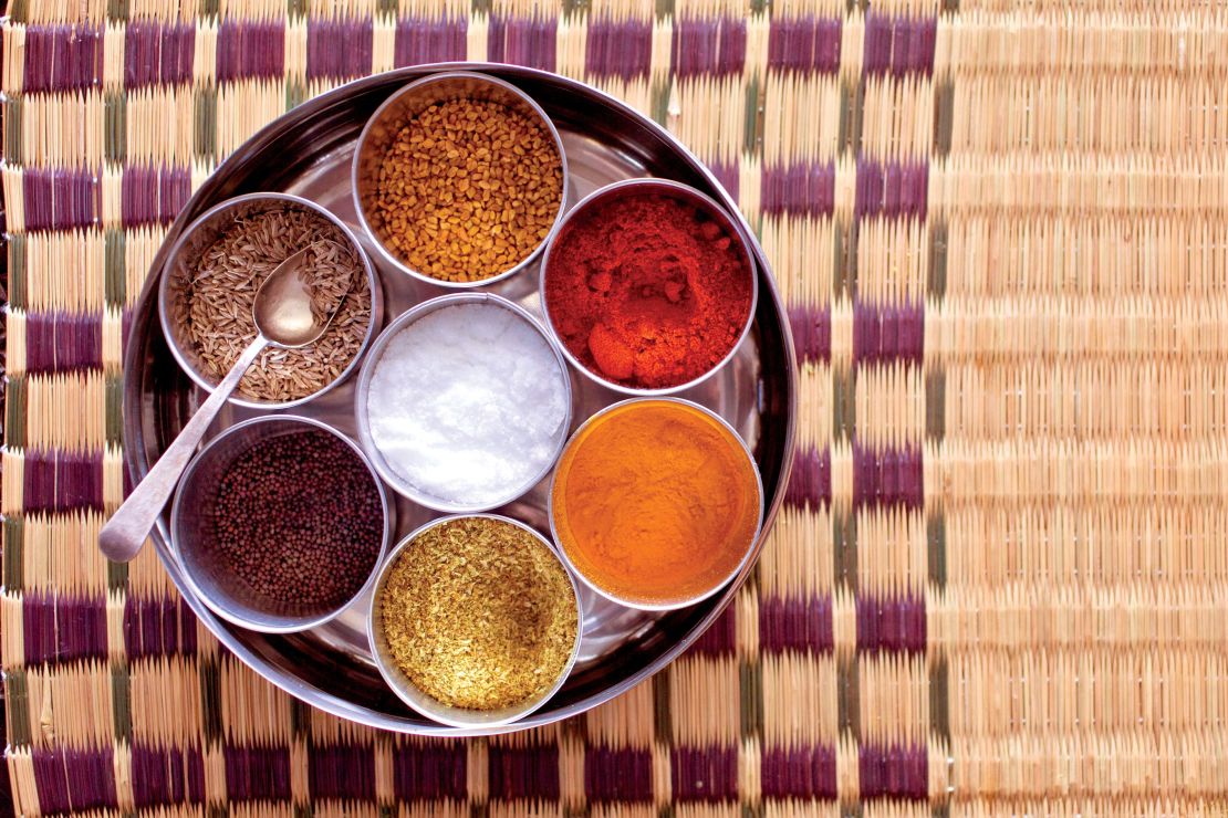 The masala dani holds all spices commonly used in Indian cooking. Though traditionally made of wood to let spices breathe, stainless steel is now the modern alternative because it does not rust.