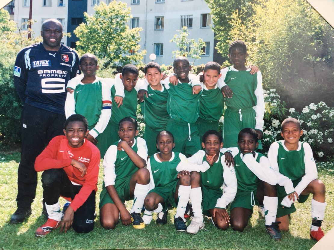 Kylian Mbappe (bottom right) playing for AS Bondy in 2008 aged nine.