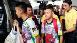epa06896127 Some of the rescued twelve members of the Wild Boar soccer team depart from the Chiangrai Prachanukroh Hospital in Chiang Rai province, Thailand, 18 July 2018. The 13 members of the Wild Boar child soccer team, including their assistant coach, who were trapped in the Tham Luang cave since 23 June 2018, will make their first appearance for a tightly-controlled interview with media after they were rescued, before returning to their homes with families.  EPA-EFE/CHAICHAN CHAIMUN