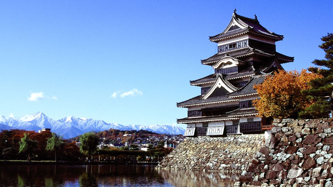 <strong>Matsumoto Castle:</strong> "This is a majestic black castle that appears to float in the middle of the moat," says Mitchelhill. "We visited the castle in autumn when the mountains in the background were covered in snow, the day was clear and crisp, the sky blue and the sun shining."  