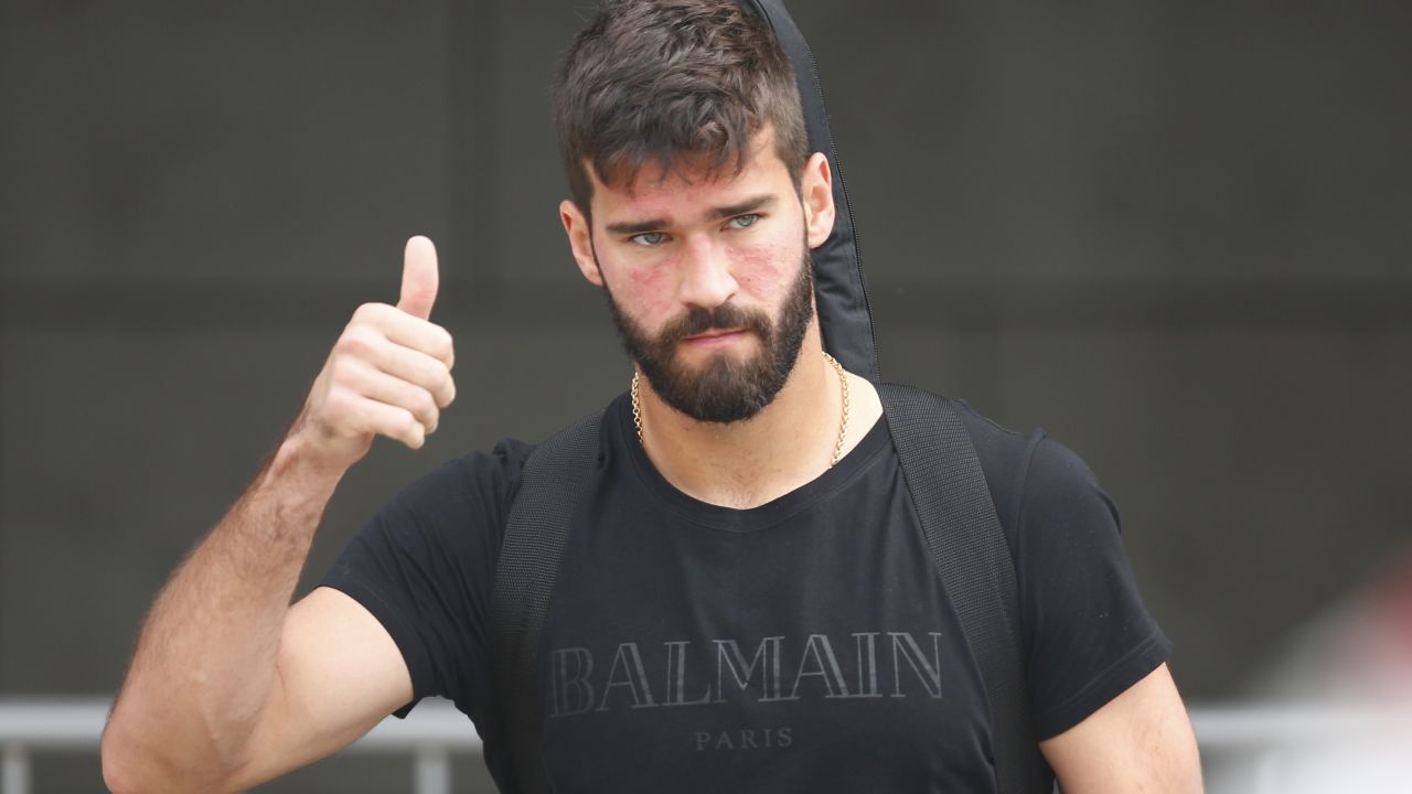 Brazil's goalkeeper Alisson leaves his team's hotel in Kazan on July 7, 2018, a day after the five-time champions crashed out of the Russia 2018 World Cup football tournament after a 2-1 quarter-final defeat to Belgium. (Photo by Benjamin CREMEL / AFP)        (Photo credit should read BENJAMIN CREMEL/AFP/Getty Images)