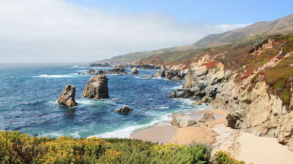 Locals swim and sunbathe at Garrapata State Park in Big Sur. 