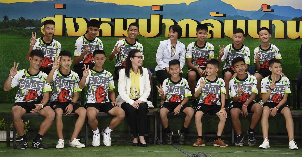 The rescued team attends a news conference in Chiang Rai, Thailand, after being discharged from the hospital on Wednesday, July 18.