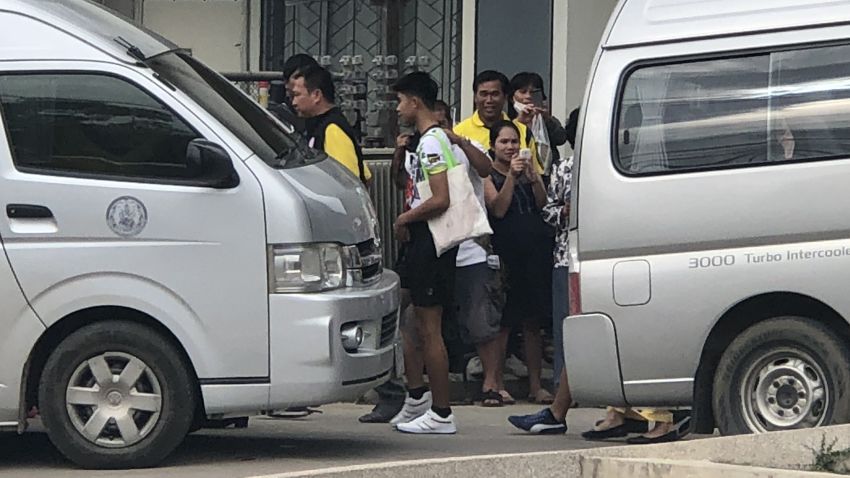 Some of the boys who were trapped in a cave in Northern Thailand outside a hospital in Chiang Rai after being discharged.