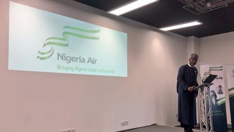 Nigerian Minister of State for Aviation, Hadi Sirika unveils the name and logo of Nigeria's new national airline at the Farnborough International Air Show in London on July 18, 2018.