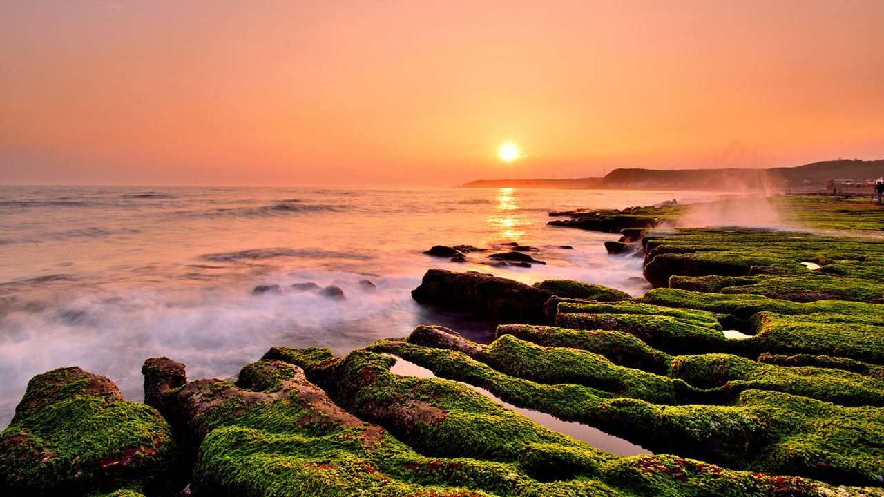 <strong>Laomei Green Reef, New Taipei City: </strong>Laomei is a volcanic reef formed during an eruption centuries ago. Its eclectic shapes are the result of years of erosion. Photographers flock to the seashore every April and May, when green algae blankets the volcanic reef. 