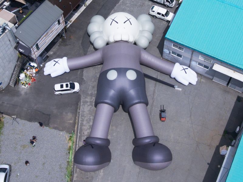 KAWS' giant floating 'Companion' appears on Seoul lake | CNN