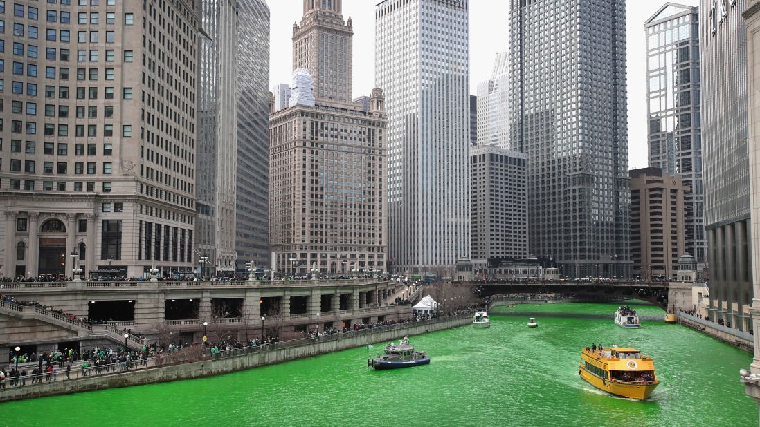 <strong>March in Chicago:</strong> Boats navigate the Chicago River shortly after it was dyed green in celebration of St. Patrick's Day. Don't fret, the dye is fish-friendly and typically fades by nightfall.