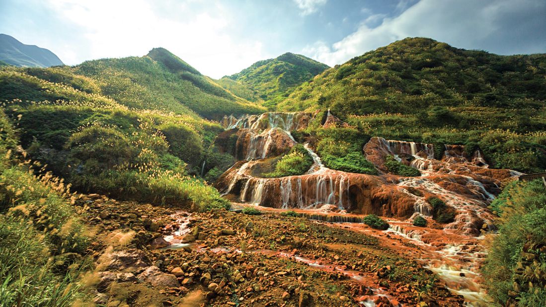 <strong>Golden Waterfall, Ruifang: </strong>Located in Ruifeng, Golden Waterfall is named for the golden-colored hillside underneath its cascade of water.  