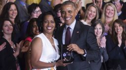 Jahana Hayes (L), a high school history teacher from Waterbury, CT, celebrates winning the 2016 National Teacher of the Year with US President Barack Obama (R) during an event at the White House in Washington, DC, May 3, 2016. (JIM WATSON/AFP/Getty Images)