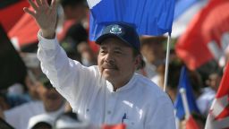 Nicaraguan President Daniel Ortega waves to supporters, as he arrives to take part in the commemoration of the 39th Anniversary of the Sandinista Revolution at "La Fe" square in Managua on July 19, 2018. - Nicaragua on Thursday marked the anniversary of its leftwing Sandinista revolution victory 39 years ago -- but the commemorations were overshadowed by President Daniel Ortega's deadly crackdown on opponents calling for his ouster. (Photo by MARVIN RECINOS / AFP)        (Photo credit should read MARVIN RECINOS/AFP/Getty Images)