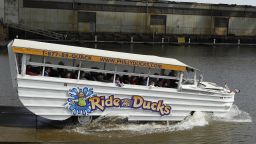 A Ride The Ducks tour splashes into the Delaware River, Thursday, April 21, 2011, in Philadelphia. Amphibious duck boat tours have resumed in Philadelphia nine months after a deadly collision with a tugboat-steered barge forced them from the water. (AP Photo/Matt Rourke)