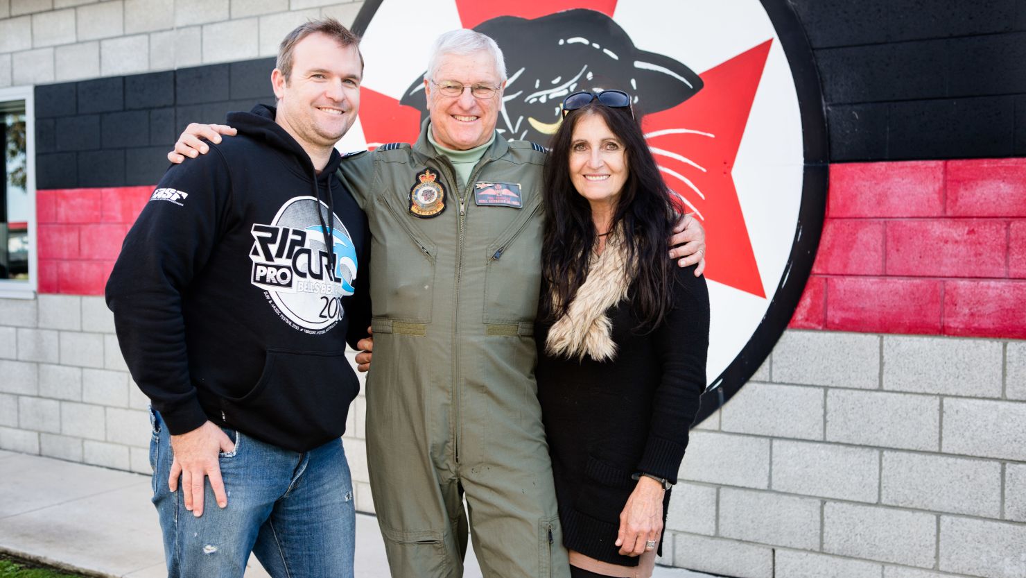 Phillip Frawley with his wife, Kerry, and son, Steven, after completing his last flight with the Royal Australian Air Force.
