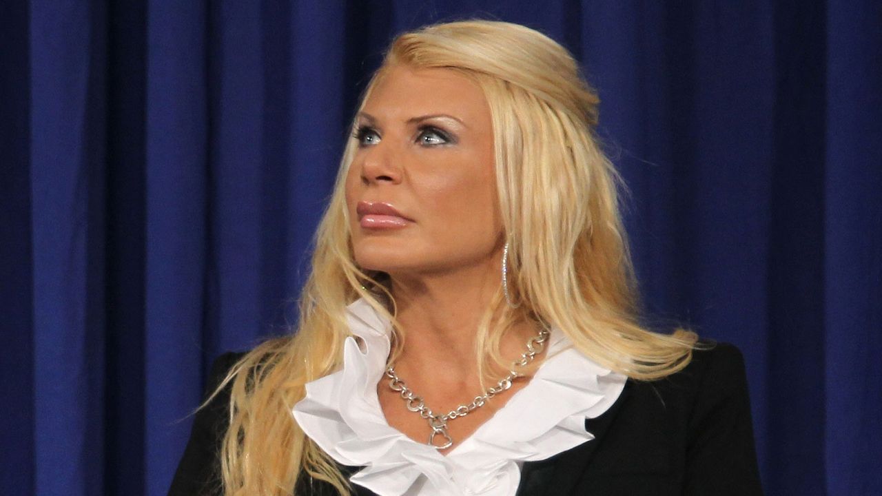 FILE - AUGUST 6: New York City comptroller candidate and former madam Kristin Davis was arrested August 5, 2013 in Manhattan for allegedly selling hundreds of prescription pills to a drug dealer. HEMPSTEAD, NY - OCTOBER 18:  Kristen Davis of the Anti-Prohibition Party looks on at the gubernatorial debate at Hofstra University October 18, 2010 in Hempstead, New York. The two main candidates, Andrew Cuomo and Carl Paladino, appeared onstage with candidates Kristen Davis of the Anti-Prohibition Party, Warren Redlich of the Libertarian Party, Howie Hawkins of the Green Party, Jimmy McMillan of the Rent is 2 Damn High Party, and Charles Barron of the Freedom Party.  (Photo by Mario Tama/Getty Images)