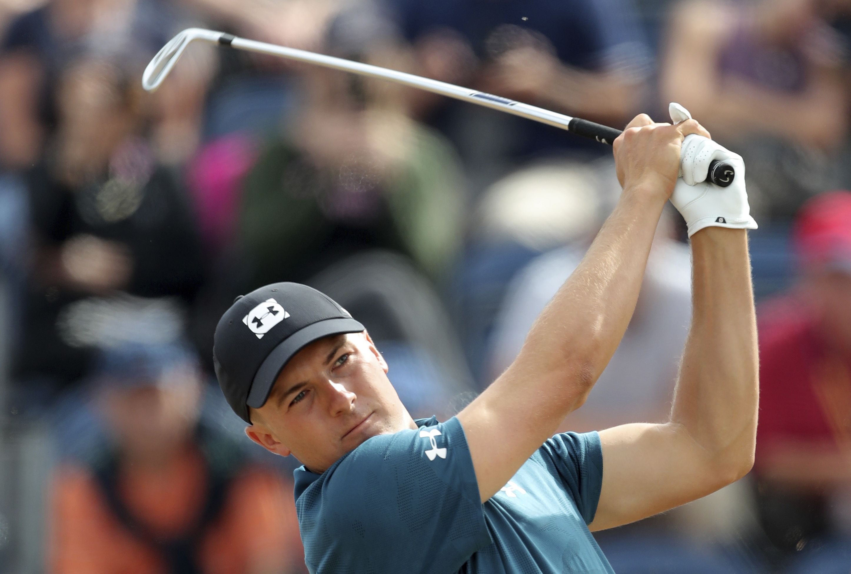 Spieth tees off the third hole Saturday.