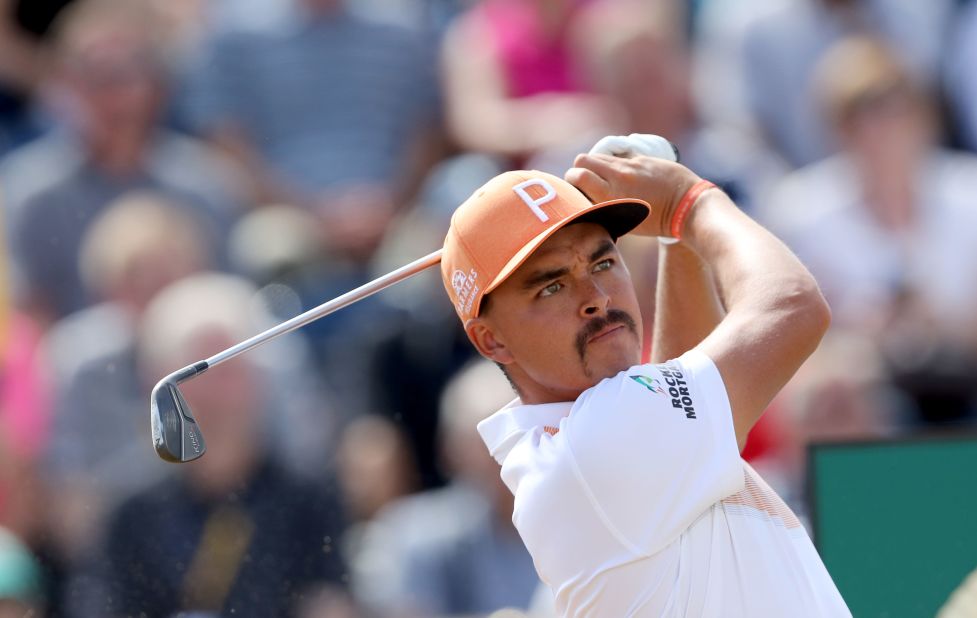 Rickie Fowler plays a tee shot on the third hole Sunday.