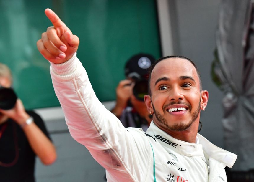 Hamilton celebrates an extraordinary comeback win at the German Grand Prix to give him a 17-point championship lead as title rival Sebastian Vettel crashed out