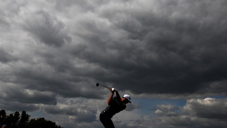 Dustin Johnson hits a tee shot during the first round of the Open Championship on Thursday, July 19.