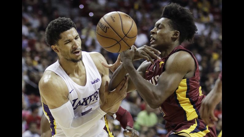 Josh Hart, left, and Collin Sexton battle for the ball during an NBA summer-league game between Cleveland and the Los Angeles Lakers on Monday, July 16.