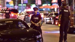 Police work the scene of a shooting in Toronto on Sunday, July 22, 2018. (Frank Gunn/The Canadian Press via AP)