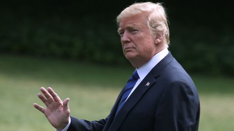 Trump declined to respond to questions shouted at him as he walked to his helicopter.