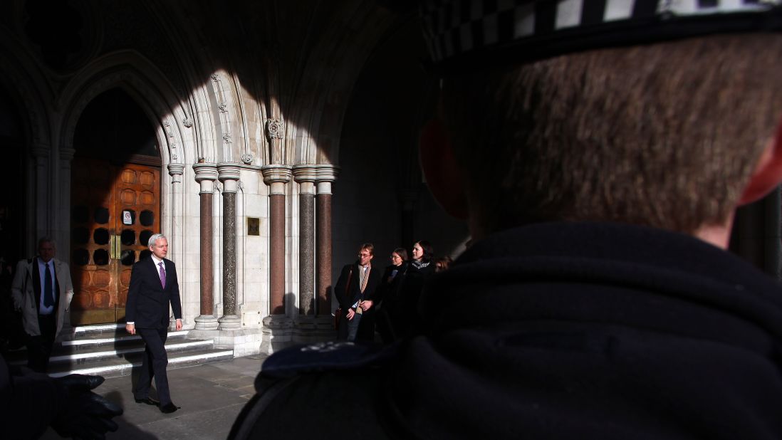 Assange leaves the High Court in London in December 2011. He was taking his extradition case to the British Supreme Court.