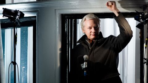Assange speaks from a window of the Ecuadorian Embassy in December 2012.